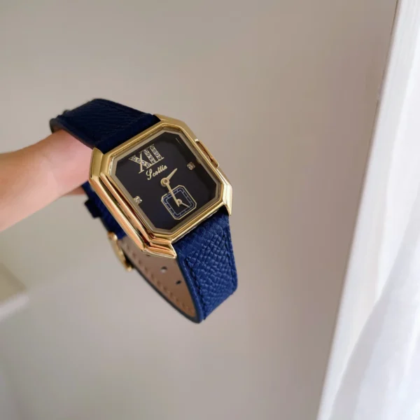 Retro vintage ladies watch with dark navy dial and blue strap