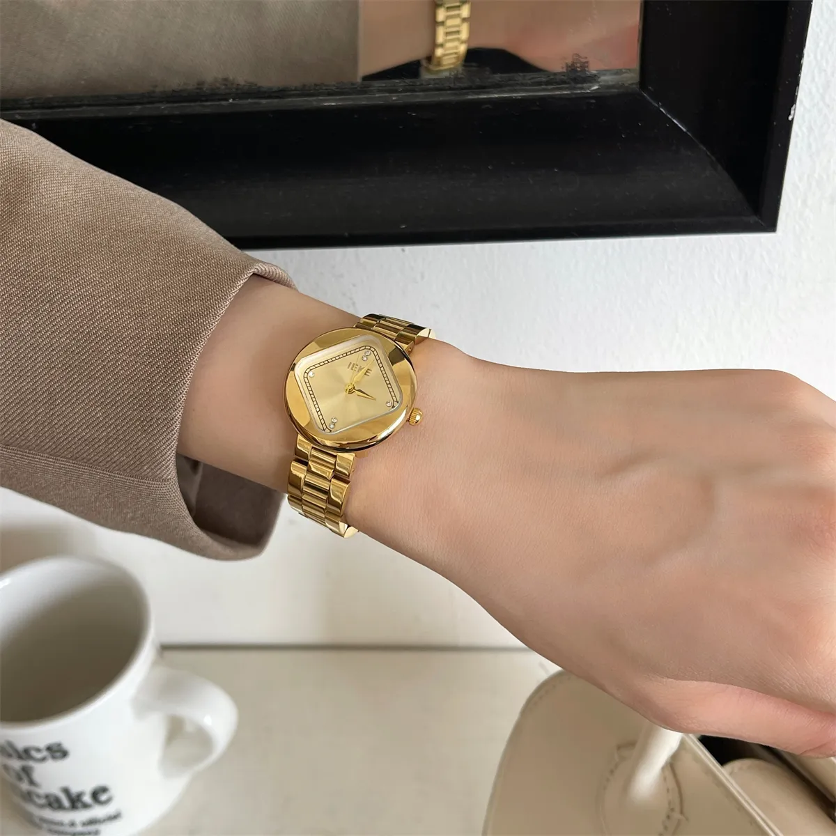 WatchTrio vintage women’s gold watch with gold dial and metal strap