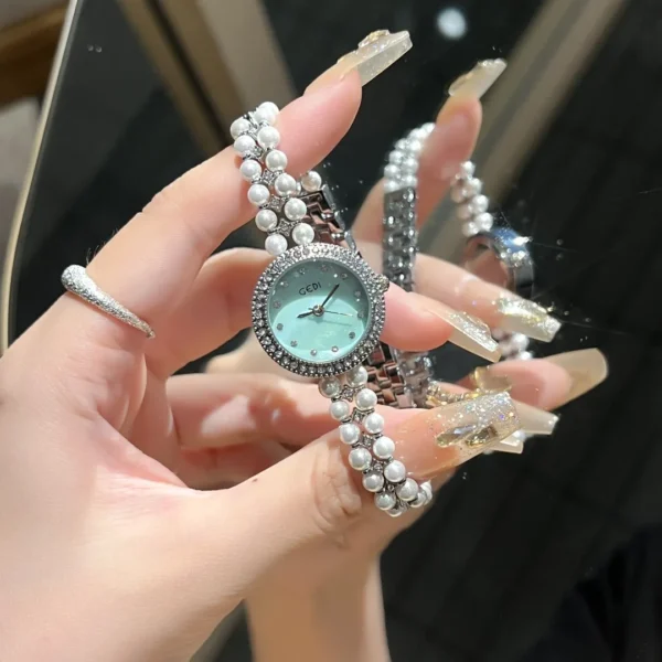 Ladies vintage watch silver pearl strap with aqua dial