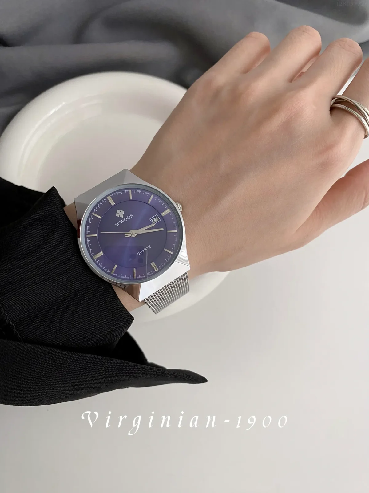 Men's vintage-style quartz watch with silver case and mesh strap