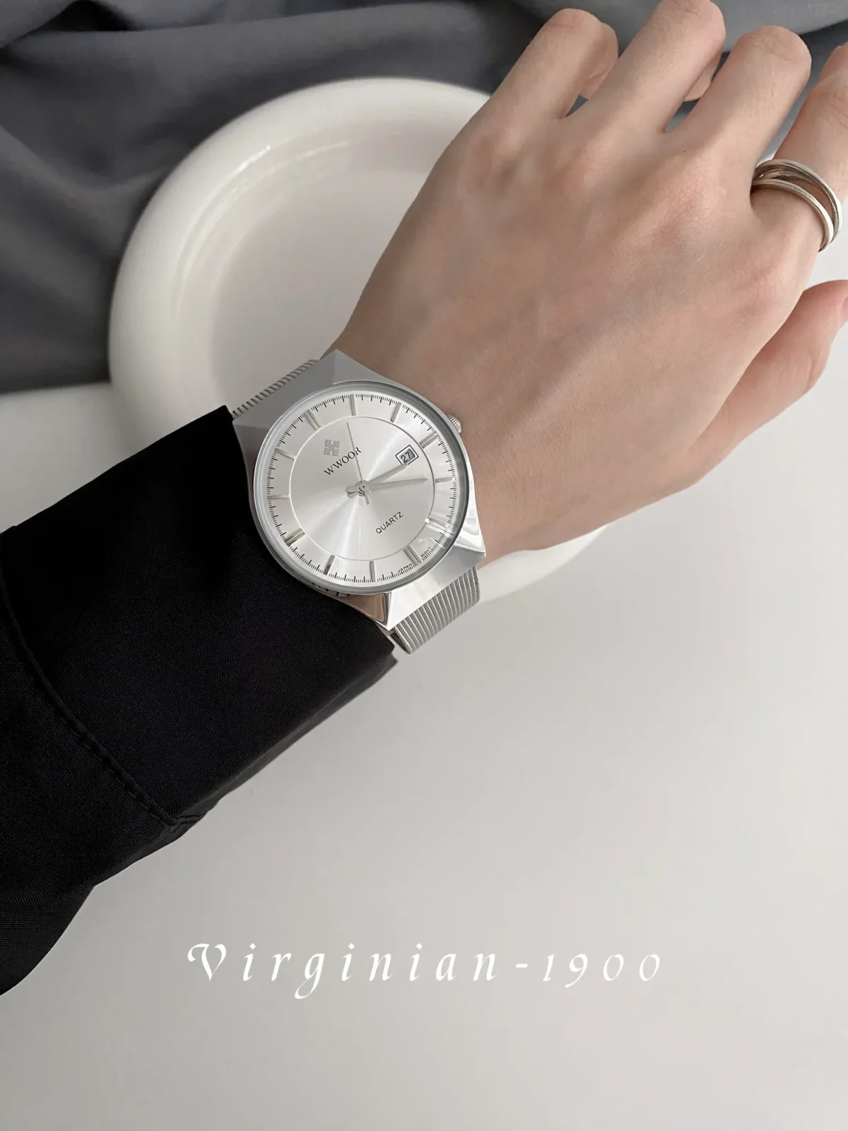 Men's vintage-style quartz watch with silver case and mesh strap