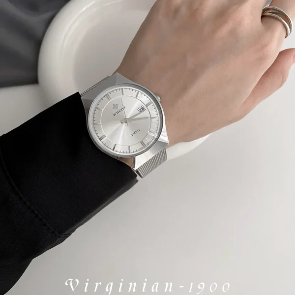 Men's vintage-style quartz watch with silver case and mesh strap