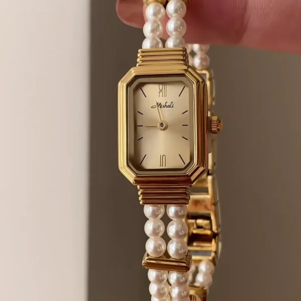 Gold pearl chain watch with luxury octagon frame and soft champagne dial