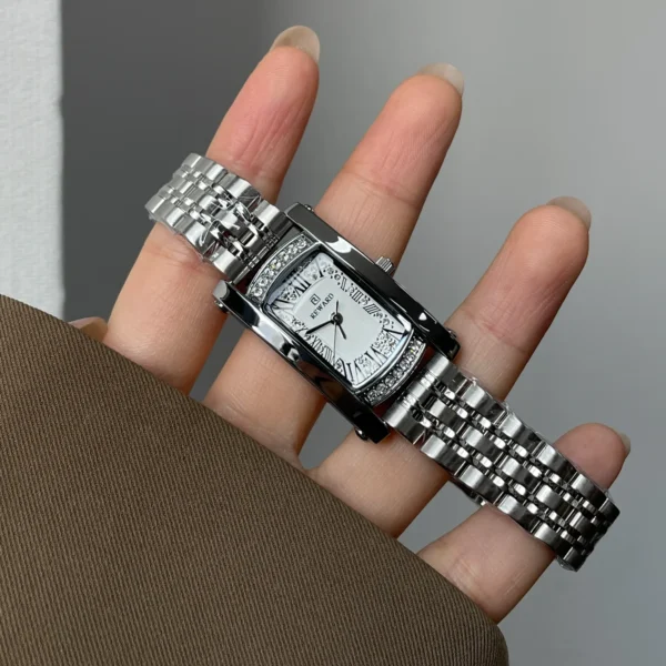 Silver rectangular women’s watch with crystal accents and stainless steel bracelet