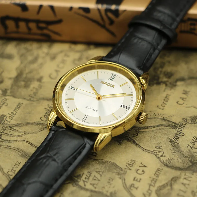 Vintage 1960s men’s leather watch with gold case – front view, mechanical design