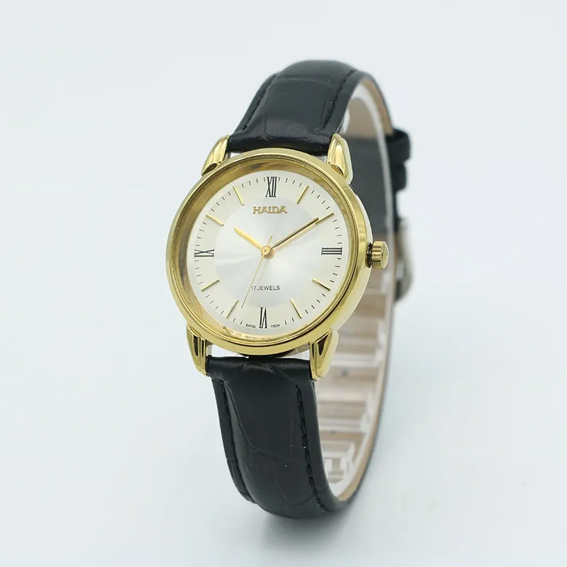Retro 1960s men’s leather watch with gold case – side angle view
