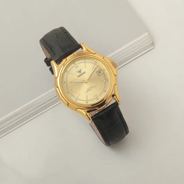 Vintage 1990s men’s gold case leather watch with black strap – front view