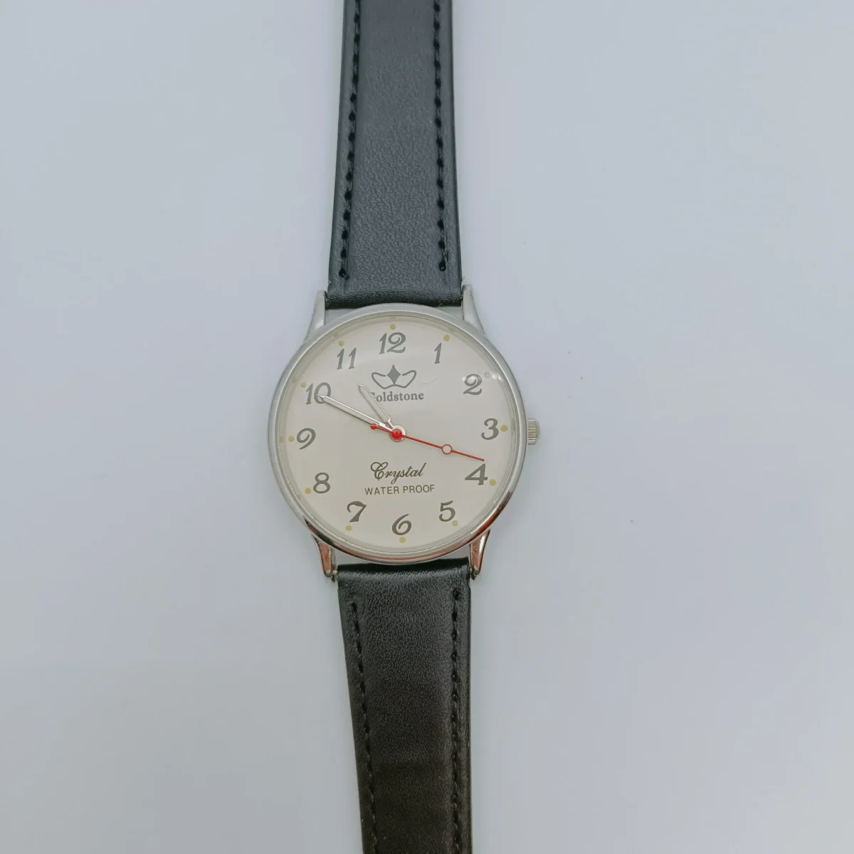 Vintage 1990s men’s leather watch with black strap – front view | WatchTrio