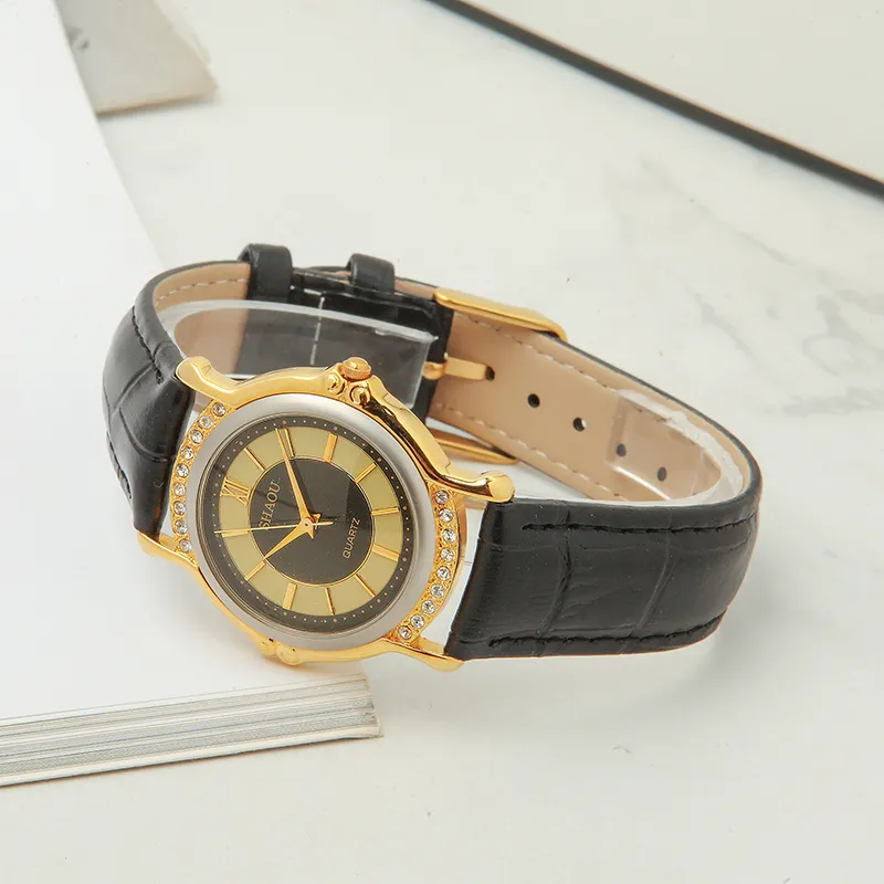 Vintage 1999 women’s quartz watch with gold case and black leather strap – side view