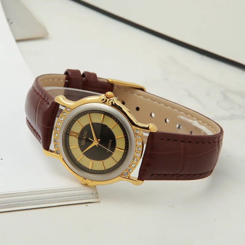 Vintage 1999 women’s quartz watch gold case with brown leather strap – side view