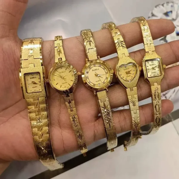 Vintage French-style gold quartz watches collection with diamond accents – group view