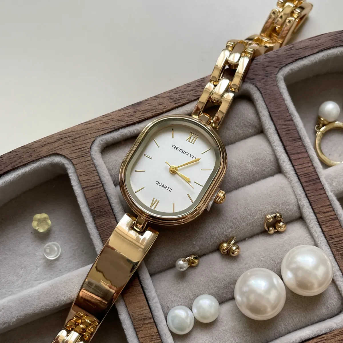 Close-up of vintage gold barrel women’s watch – classic dial and polished case