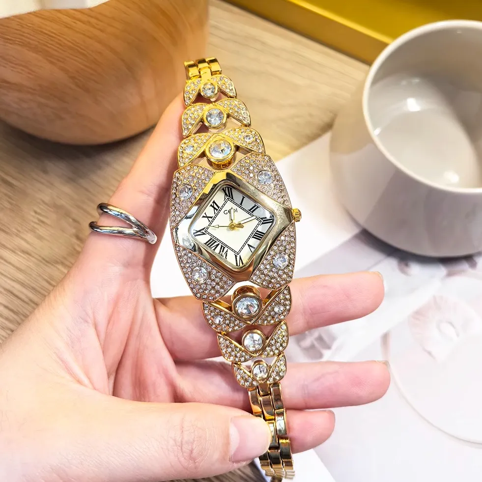 Vintage gold women’s diamond watch with hollow bracelet and mother-of-pearl dial – WatchTrio