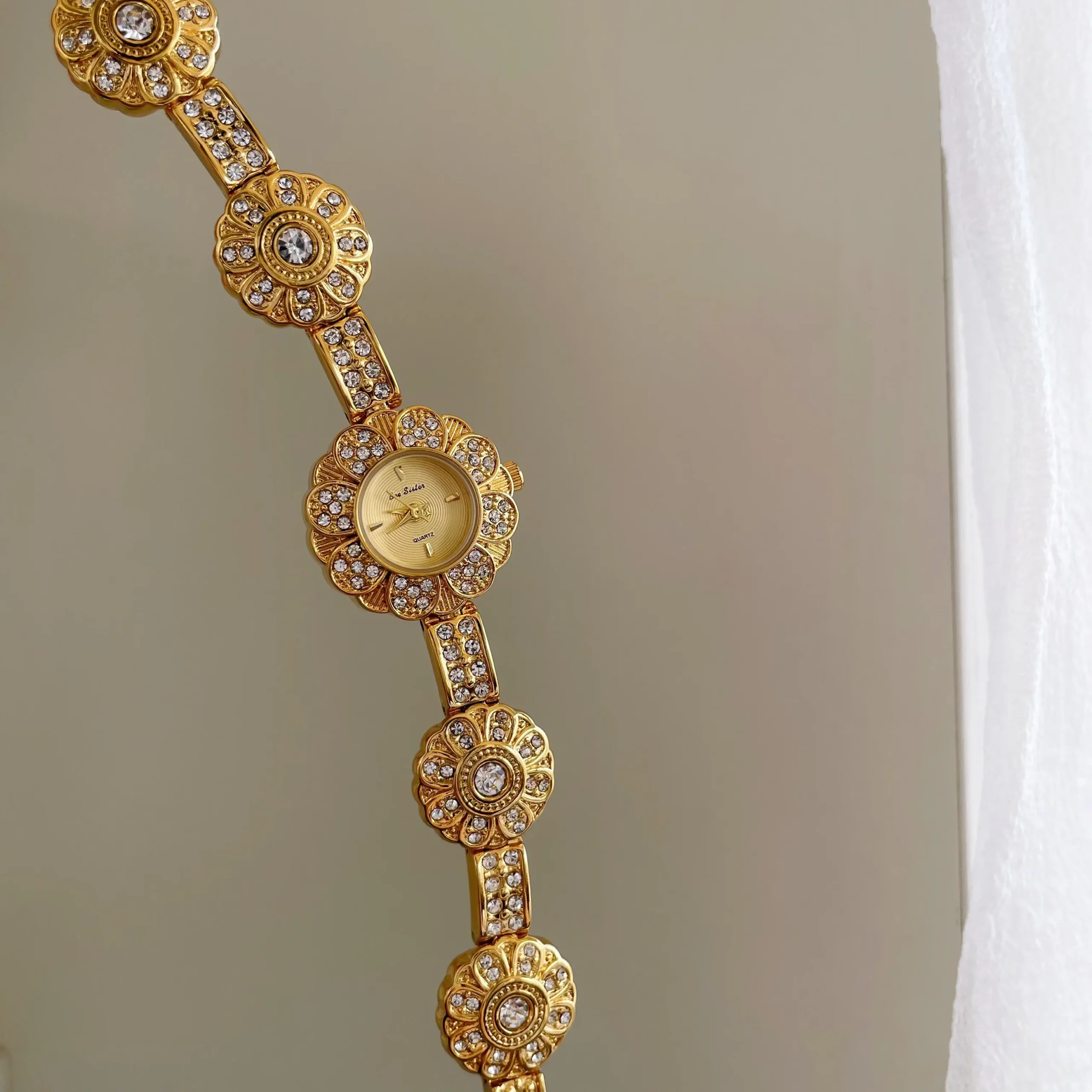 Retro gold flower bracelet watch for women with crystal embellishments – WatchTrio