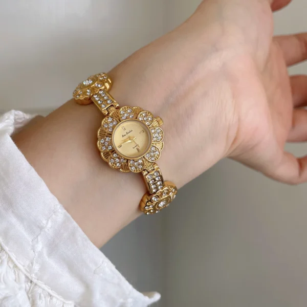 Vintage gold women’s flower bracelet watch with crystal floral design – WatchTrio