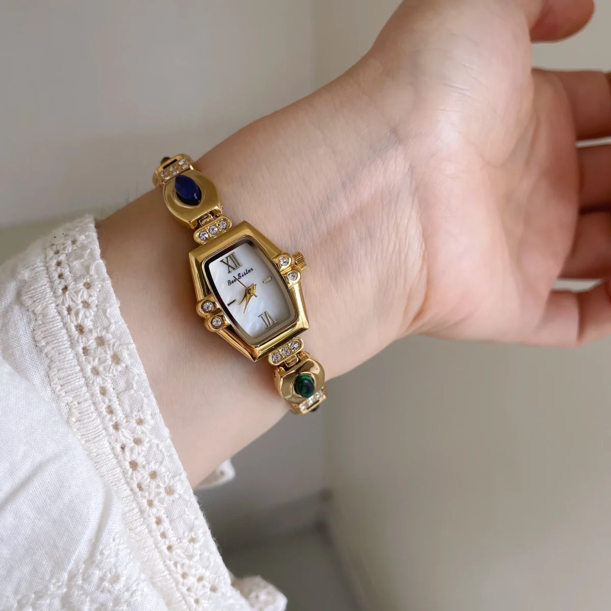 Vintage gold women’s barrel-shaped bracelet watch with colorful gemstones – WatchTrio