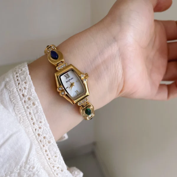 Vintage gold women’s barrel-shaped bracelet watch with colorful gemstones – WatchTrio