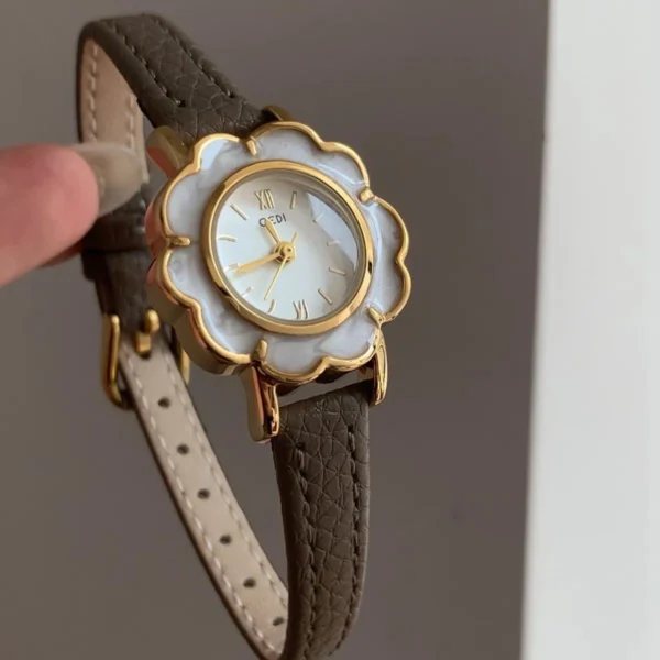 Vintage gold ladies leather watch with flower dial