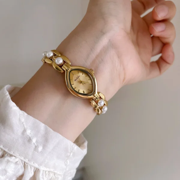Vintage gold marquise women’s watch with pearl bracelet strap – front view