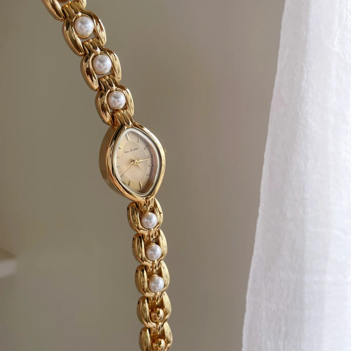 Retro gold marquise women’s watch with pearls – elegant side angle