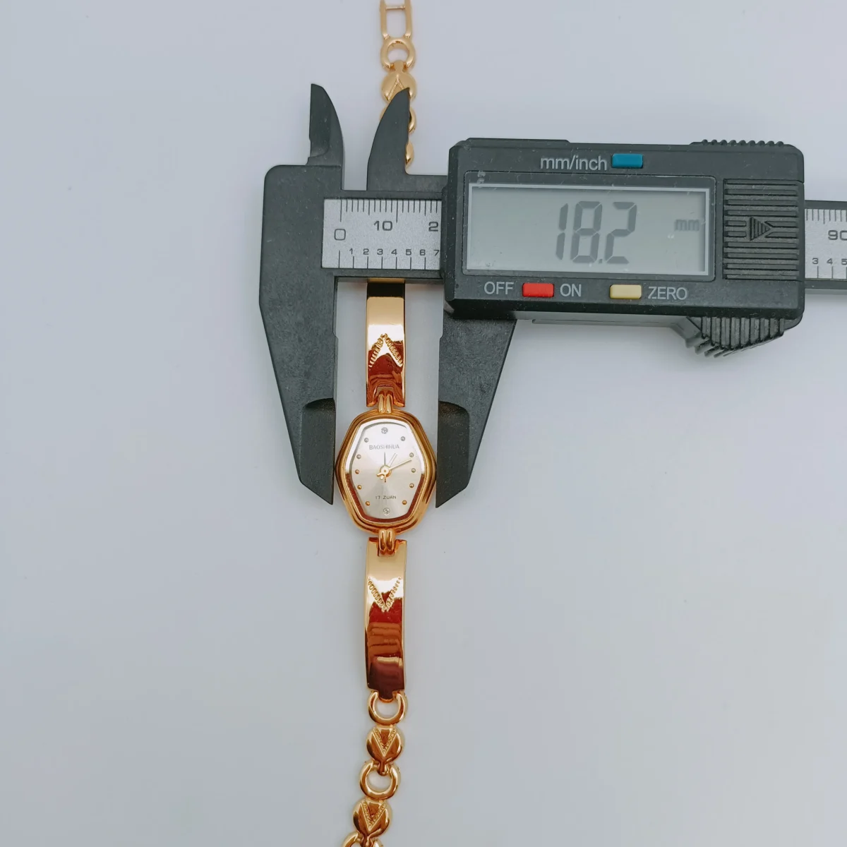 Vintage gold women’s watch with hexagonal dial size measurement