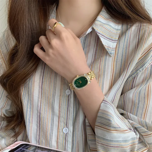Retro gold oval women’s watch with green mother-of-pearl dial and diamonds – WatchTrio