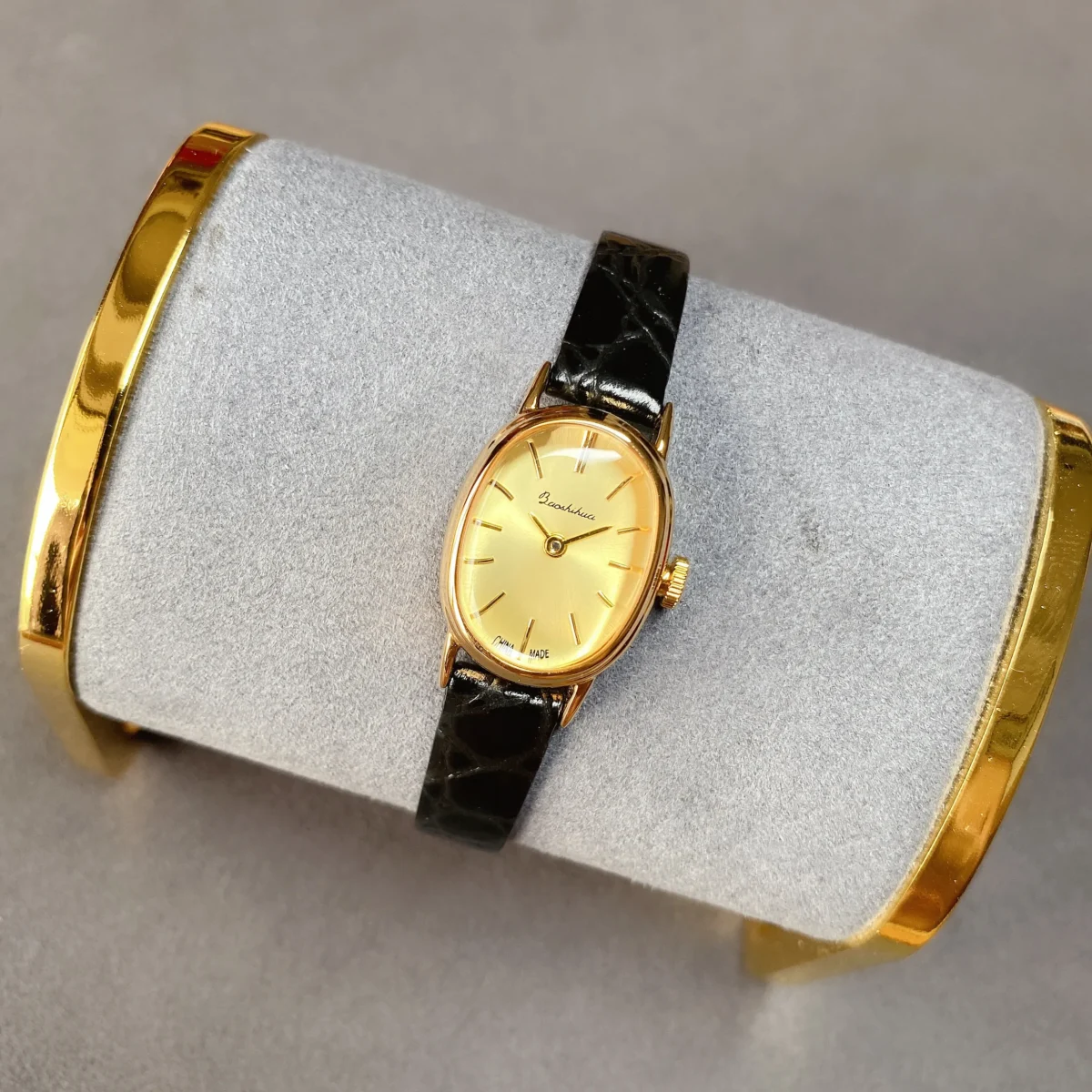 Vintage gold oval women’s leather watch with black strap – WatchTrio