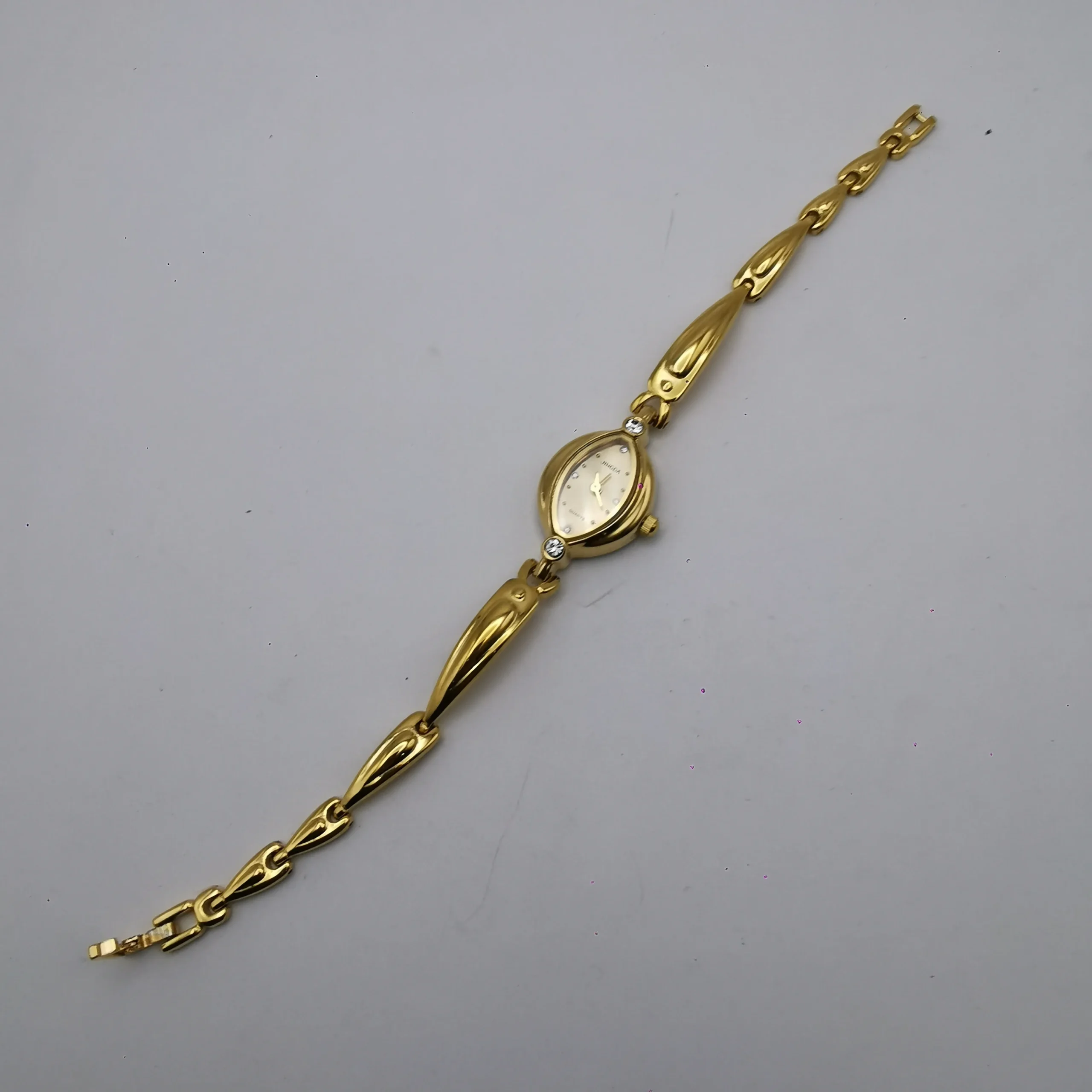 Vintage gold oval women’s bracelet watch with crystal details – WatchTrio