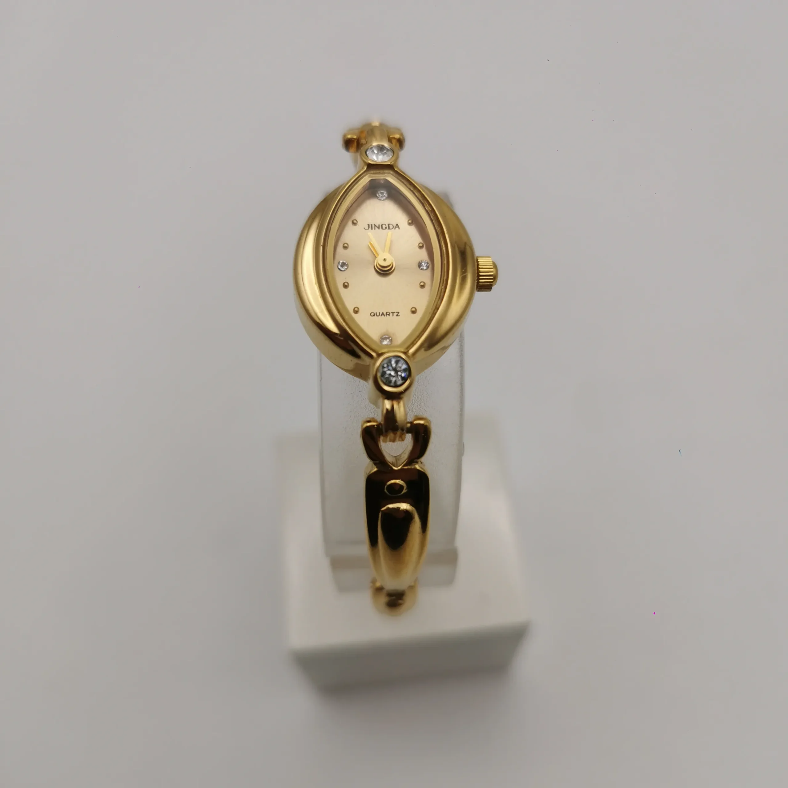 Vintage gold oval women’s watch with crystal accents on dial – WatchTrio