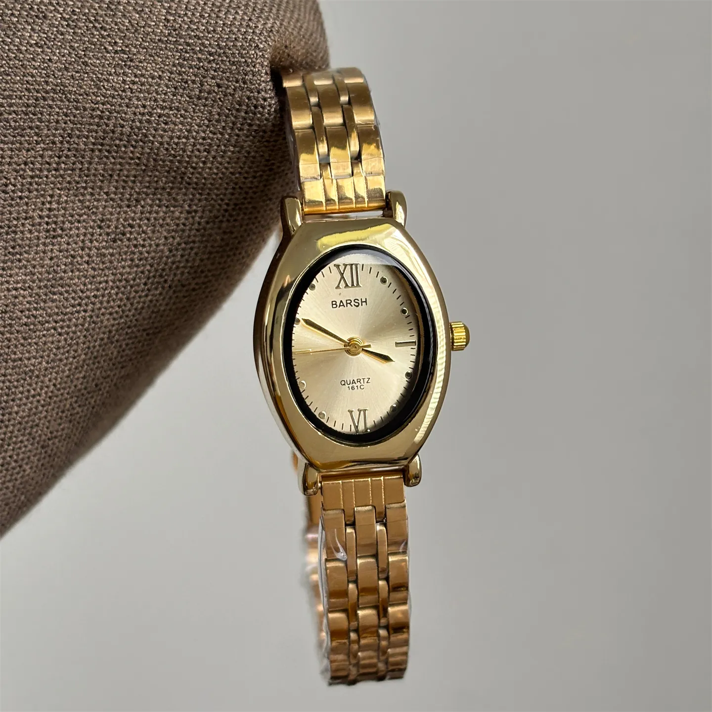 Vintage gold oval women’s watch with gold dial