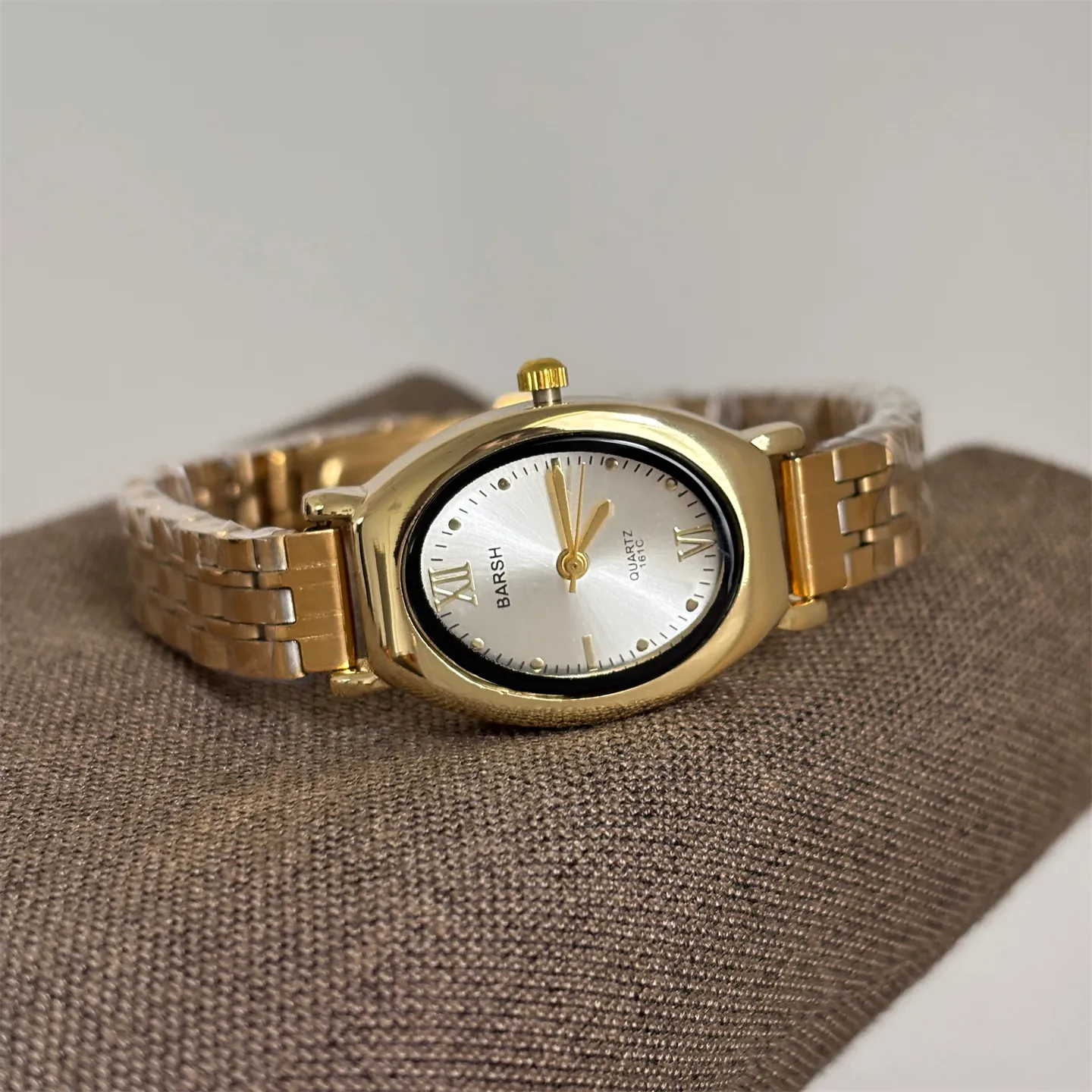 Vintage gold oval women’s watch with white dial