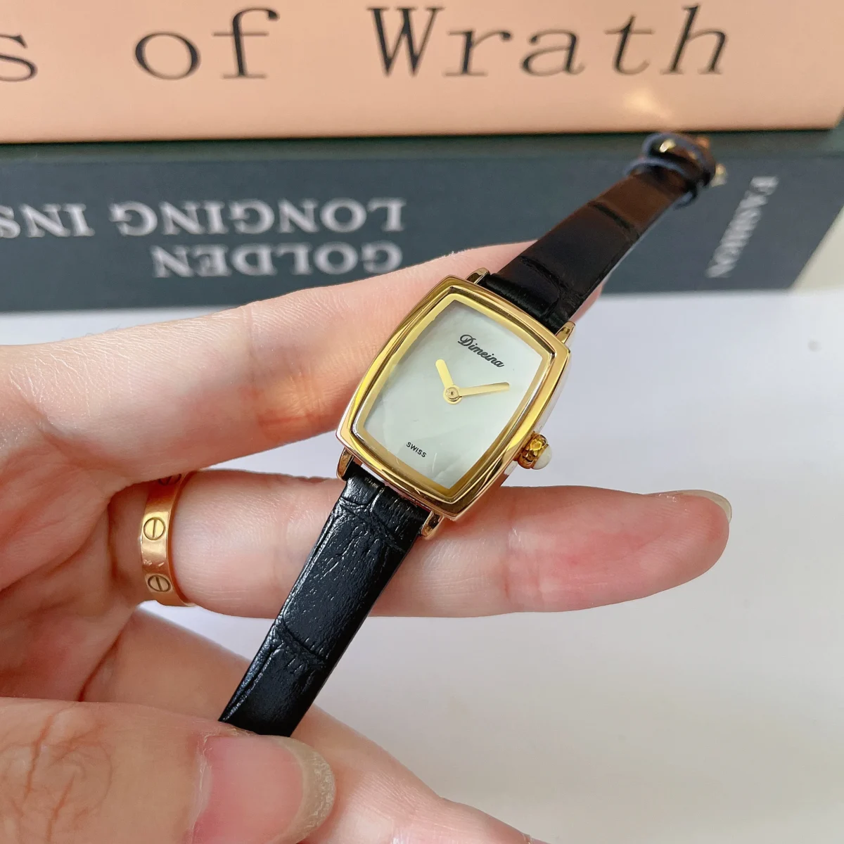 Vintage gold rectangular women’s leather watch with black strap – WatchTrio