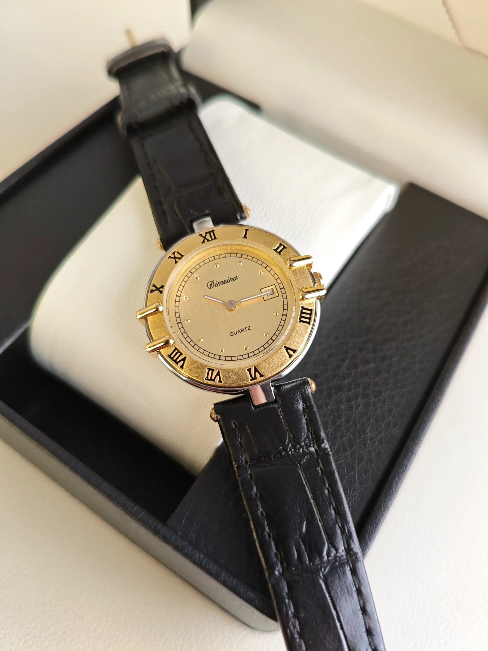 Vintage gold women’s leather strap watch with Roman numerals side view – WatchTrio