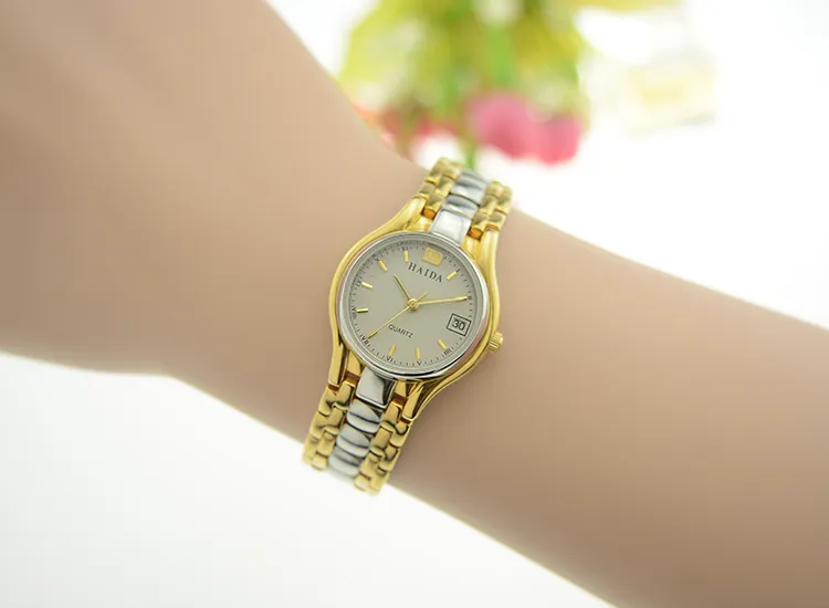 Ladies vintage two-tone gold and silver quartz watch on wrist – WatchTrio