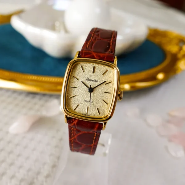 Vintage gold women’s leather watch with brown strap and square dial – WatchTrio