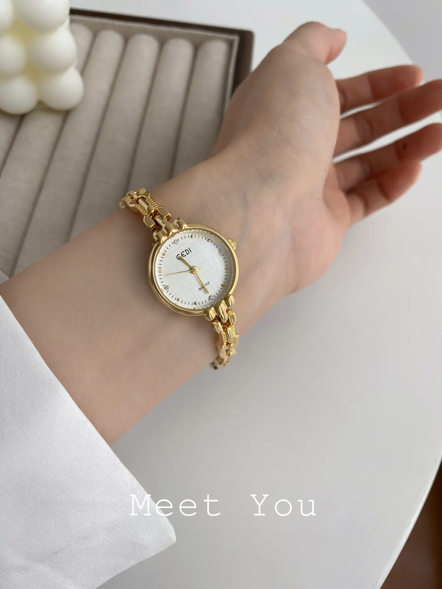 Close-up of gold women’s watch with mineral glass – WatchTrio