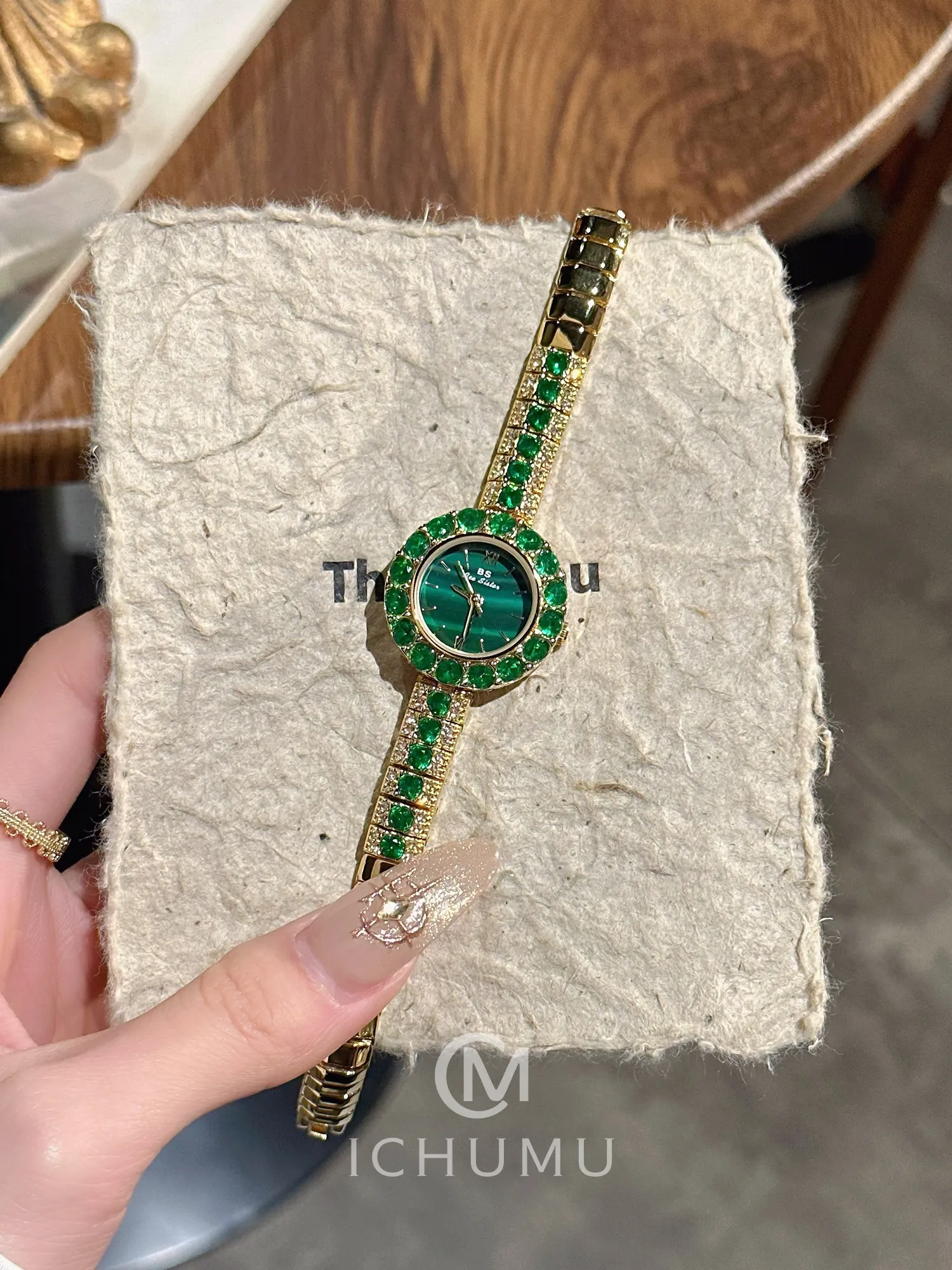 Vintage gold women’s watch with green gem dial – WatchTrio