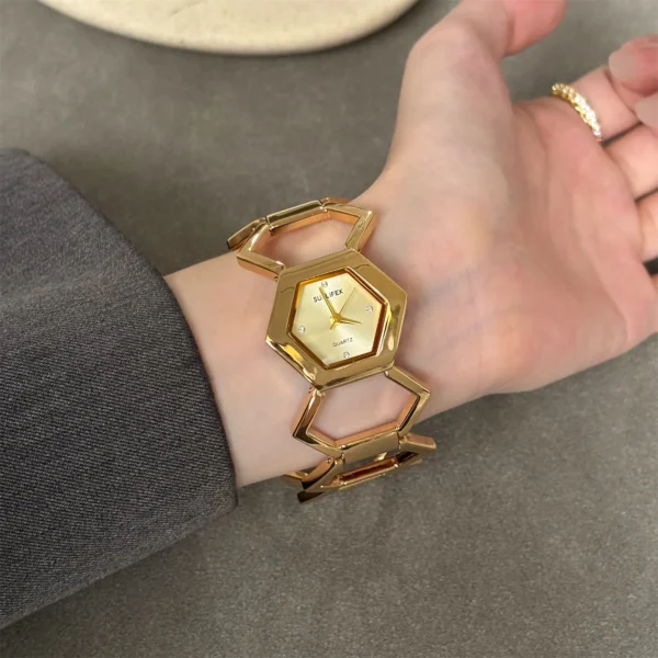 Vintage hexagon women’s watch with gold-tone strap and geometric dial – WatchTrio