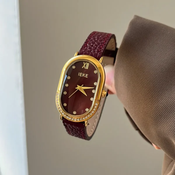 Vintage red leather oval women’s watch with red dial