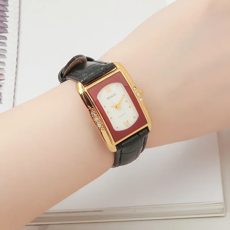 Retro vintage rectangular women’s watch with black leather strap and red dial