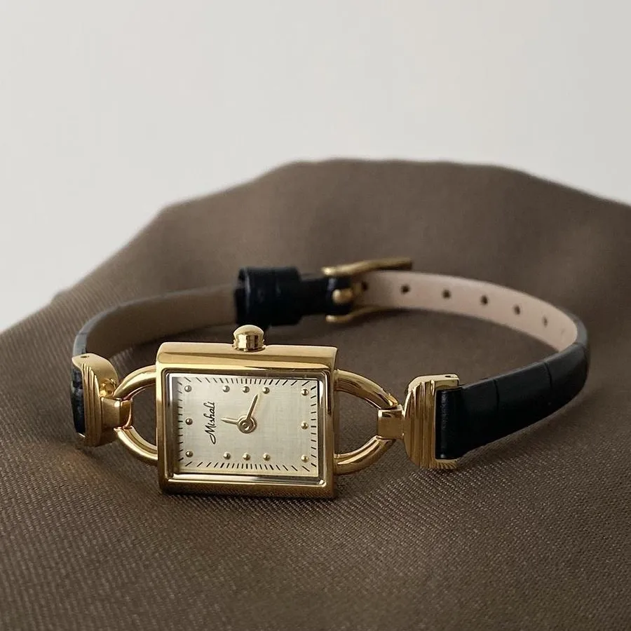 Vintage women’s leather watch with black strap and gold square dial – side angle – WatchTrio