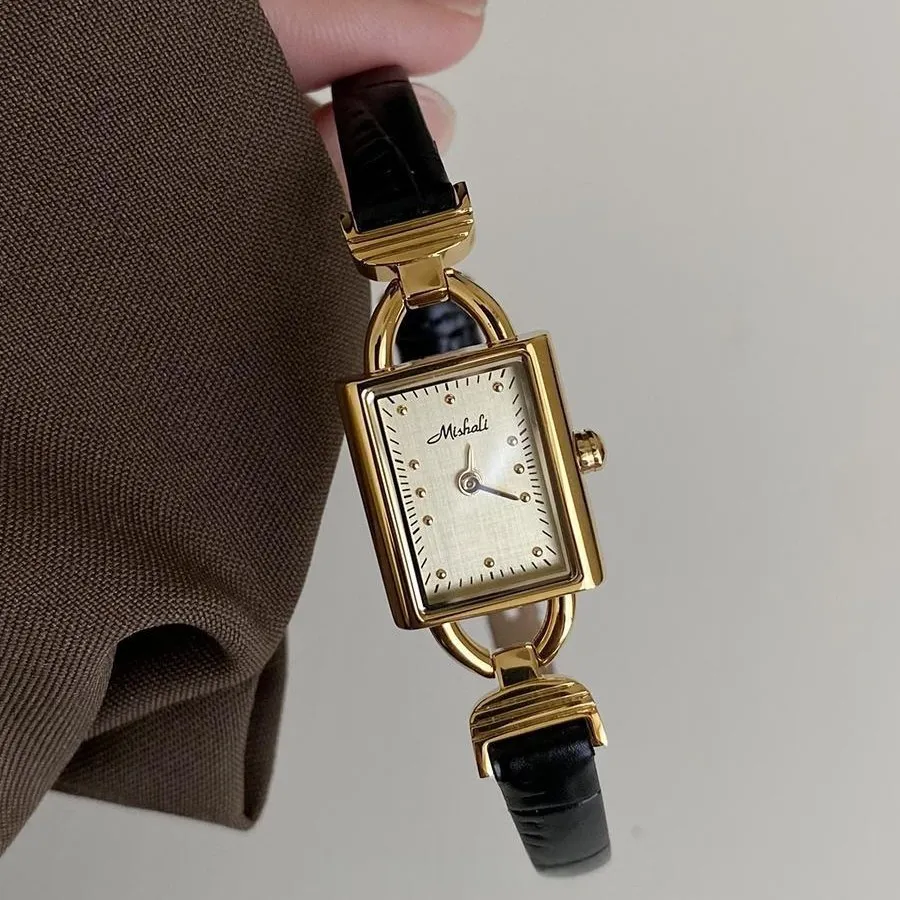 Vintage leather women’s watch with black strap and gold square dial – WatchTrio