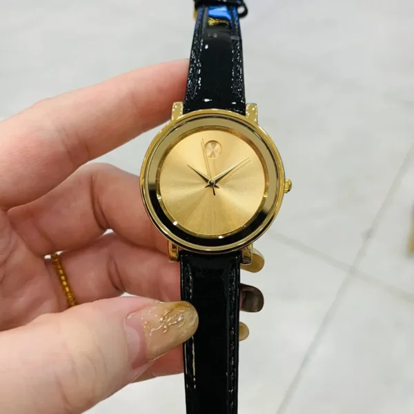 Vintage women’s leather watch with gold dial and black strap – WatchTrio