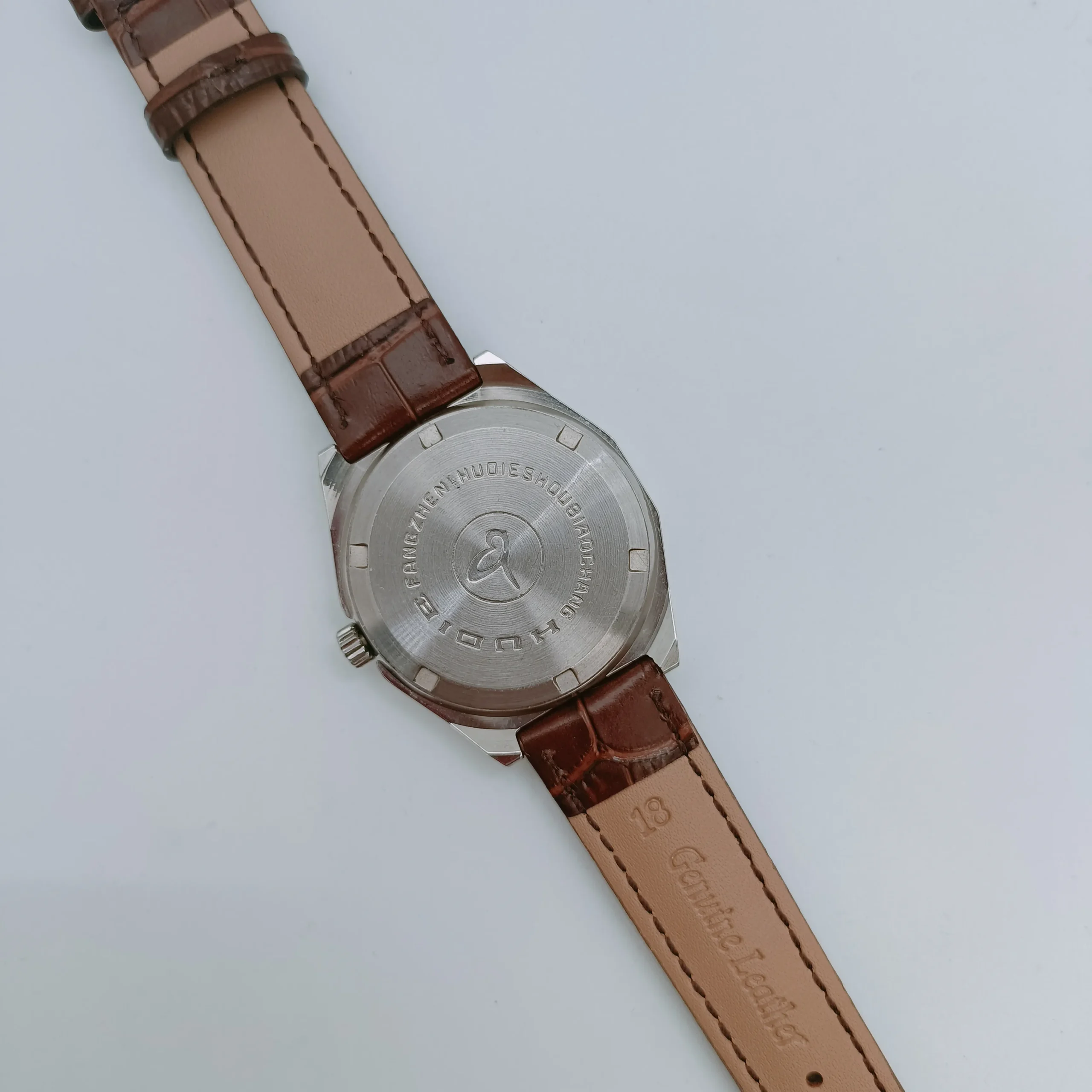 Vintage Men’s Leather Dual Calendar Watch 1989S — stainless steel back case with genuine leather strap
