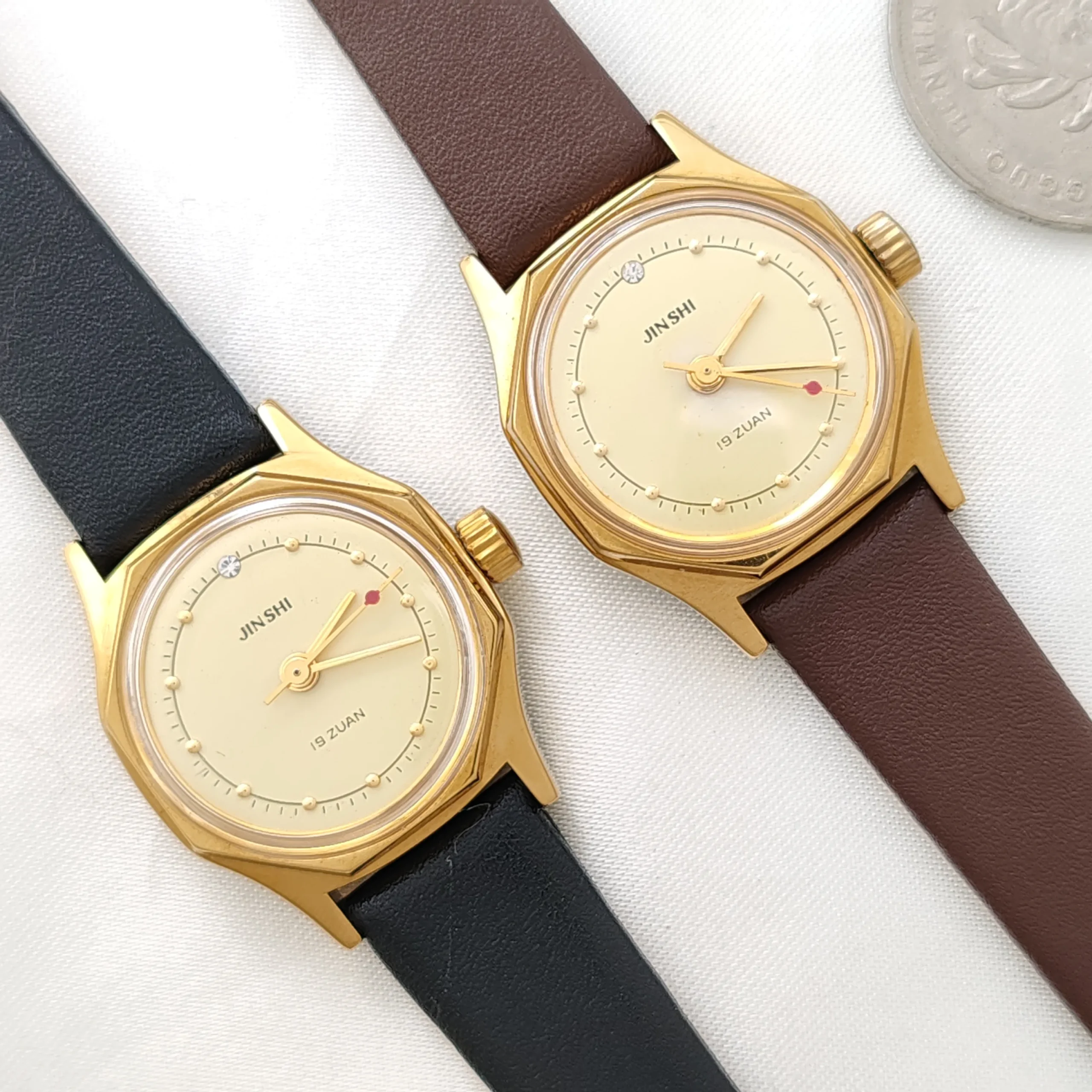 Pair of vintage octagon gold women’s watches with leather straps – WatchTrio