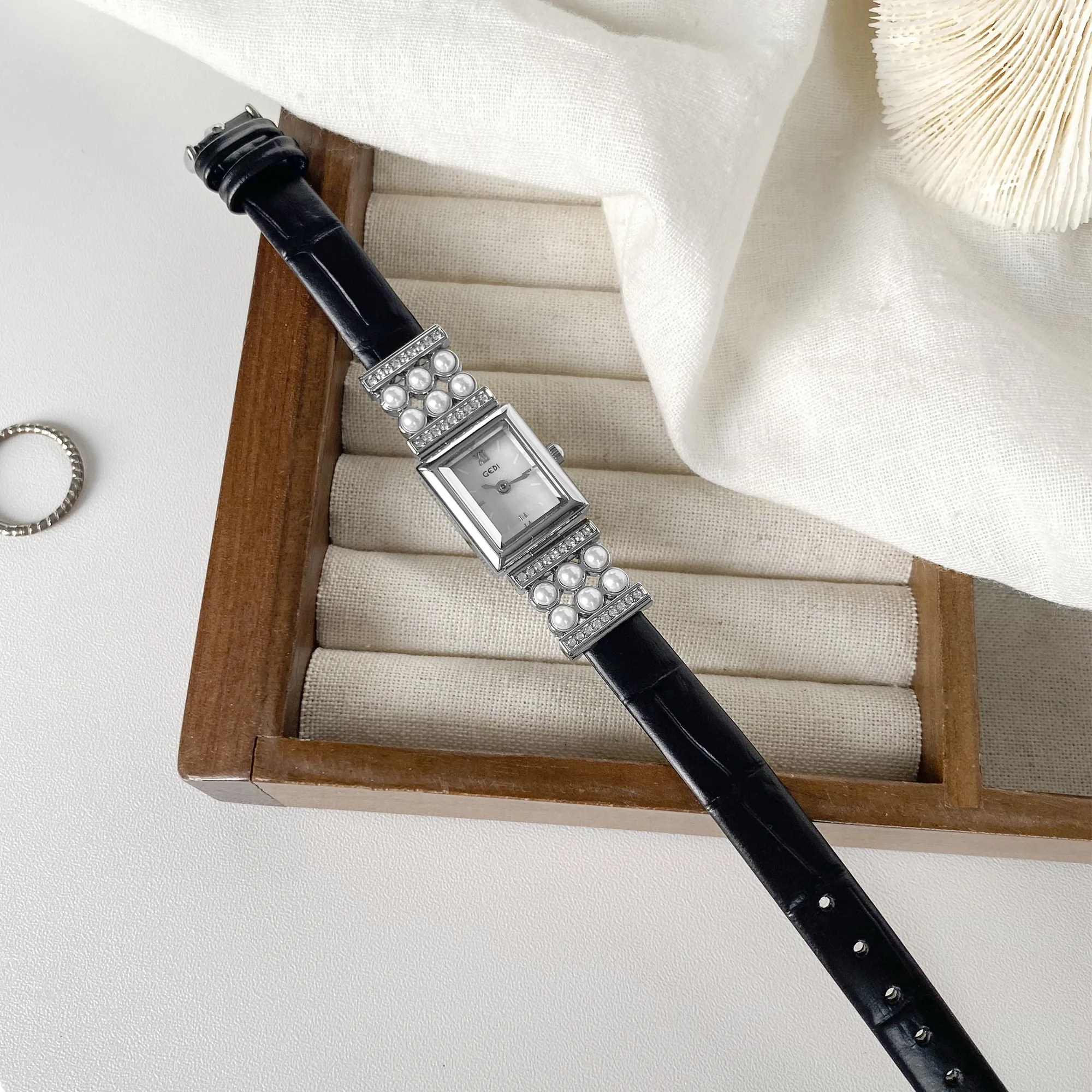 Vintage silver women’s watch with black leather strap and pearls – WatchTrio