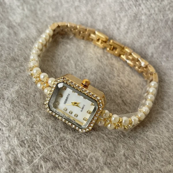 Vintage gold women’s pearl bracelet watch with crystal bezel – WatchTrio