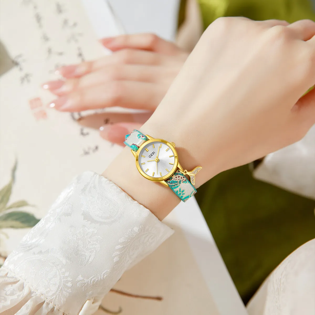 Vintage porcelain women’s watch with patterned strap on wrist