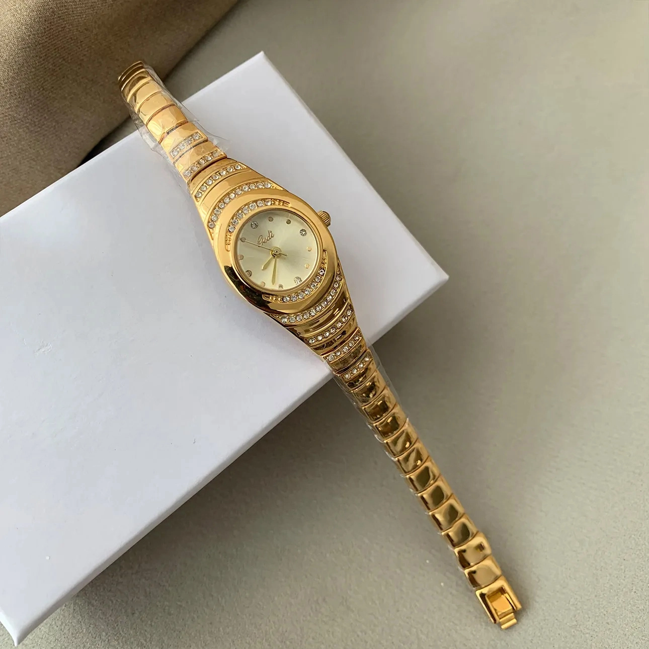 Vintage Serpentine Pavé Gold Women’s Bracelet Watch – lifestyle angle view by WatchTrio