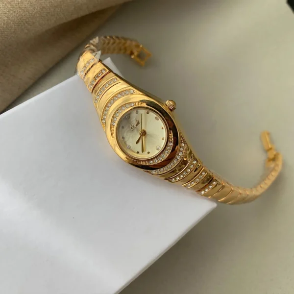 Close-up of Vintage Serpentine Pavé Gold Women’s Bracelet Watch with 20mm sunburst dial – WatchTrio